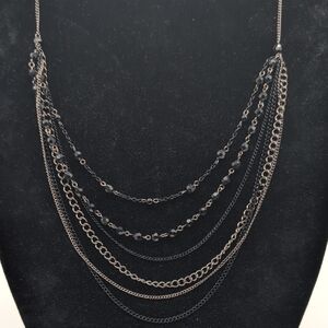 Elegant Multi-Layered Silver Toned Necklace With Black Beads